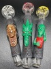 MED.GLASS PIPES CLAY WITH FIGURINES
